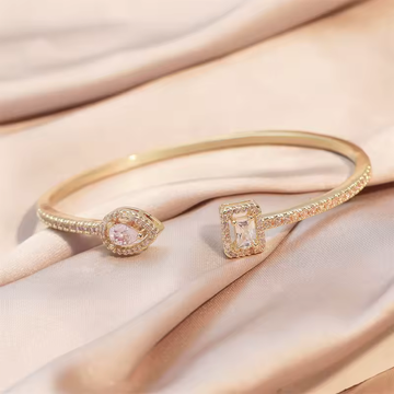 luxurious geometric bangles in gold